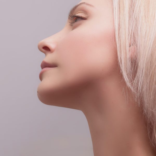 close up photo of womans jawline